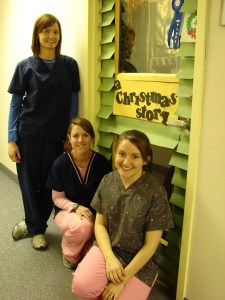 Tessa, Sara and I by our prize-winning Christmas door in front of the lab, 2007