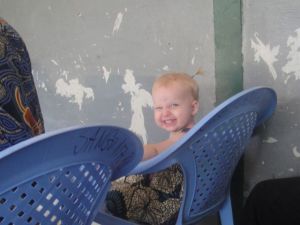 At church yesterday, she wanted to sit next to someone else...this is her new smile-on-command