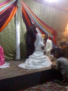 Saying their vows, on their knees