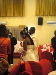 The bride and groom enter the reception