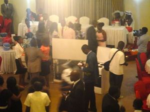 The freezer and oven - and you can see the two women carrying the microwave.  At the upper right are the bridesmaid, in the hats.