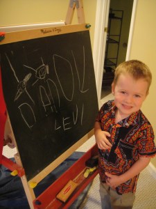 Father's Day drawing for daddy - completely unprompted!  Levi and Daddy can be seen swimming above the D and A...