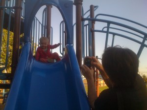Amelia is addicted to slides - and her great aunt Edie takes a picture.