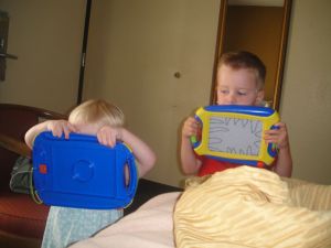 Levi's new past time - making a dino mouth and roaring. Amelia...she's still getting the point.