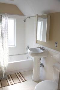 New master bathroom!  Matthew did all the tile work himself.  And the tiny tub?!  It's four feet!!