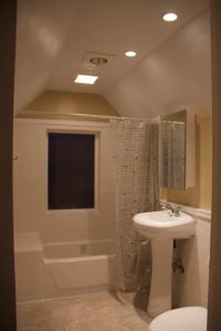More master bath - except at night.  Matthew dropped the vaulted ceiling to make room for the lights, fan and heat lamp.