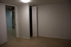 Basement bedroom 2, after - moved the closet, covered the ducts properly