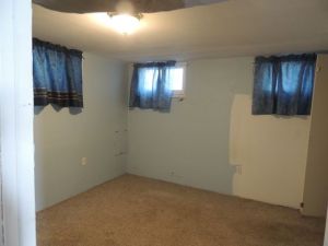 Basement bedroom 1, before