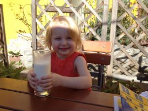 Our little discovered restaurant experience in Germany, Amelia was very happy with her giant glass of milk!