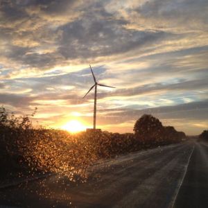Crossing the border into the Netherlands at sunset, complete with windmills, of course.