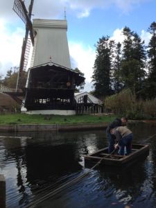 The men and their kids pull themselves across the lake in Arnham