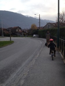 My view of the same grocery store run.  You can see the Alps on both sides...