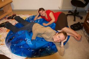 Remember my friend, an MAF wife going to Eastern DRC, who had her baby at home?  Well, this is me and my awesome friend Shannon (an OB who is also going to Congo and helped with the delivery)...we did most of the clean-up and at 4am this is how you deflate a birth pool.