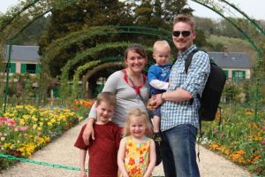 Family Portrait, with Monet's house and garden in the background.