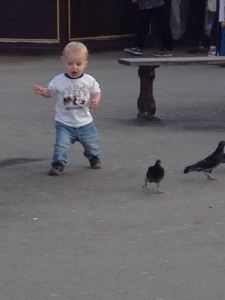 Axel, under the Eiffel Tower, having the best time ever, chasing pigeons.  And screaming.  Did you know loud sounds echo under the Eiffel Tower?  They do, indeed.
