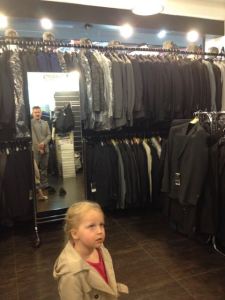 Watching Daddy buy a lightweight (heavily discounted) Italian suit for important business meetings Congo.