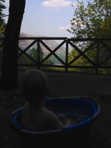 Axel pondering the wonders of the Italian Alps from our cabin.