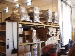 The bins all wrapped in plastic, on pallets, waiting for us.