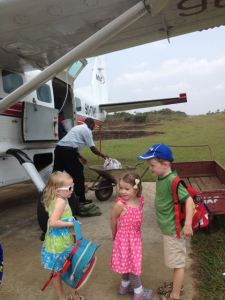 Waiting at the place with a fellow MAF kid who happened to be arriving in Vanga to spend the night with her family.